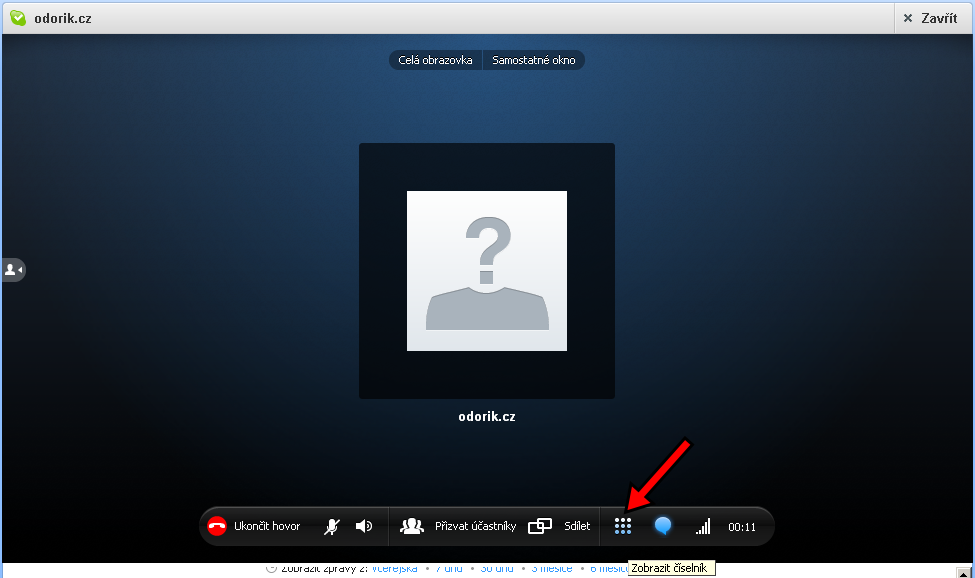 After the start of the call move the mouse pointer to the area under the photo. Select the item "zobrazit číselník" in the menu.